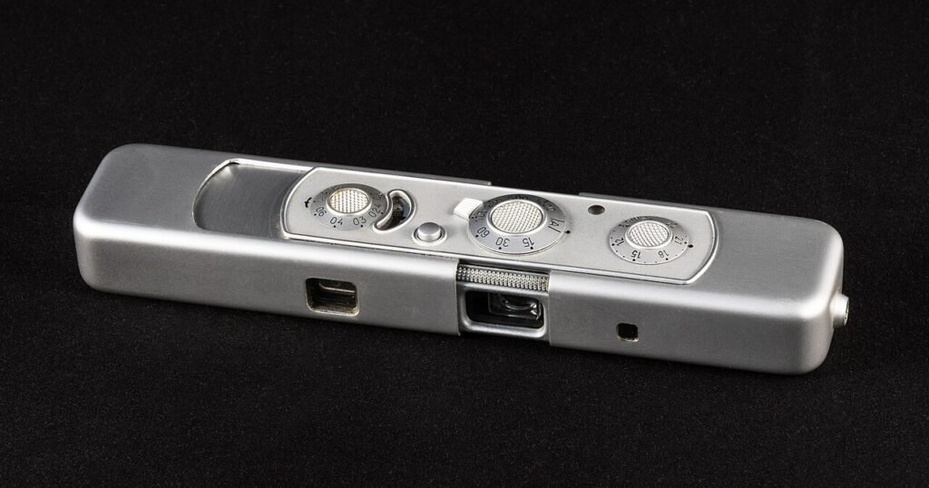 Minox sub-miniature camera, small enough to sit in a closed hand