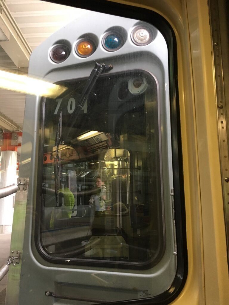 View through a car's rear window of the vehicle following behind